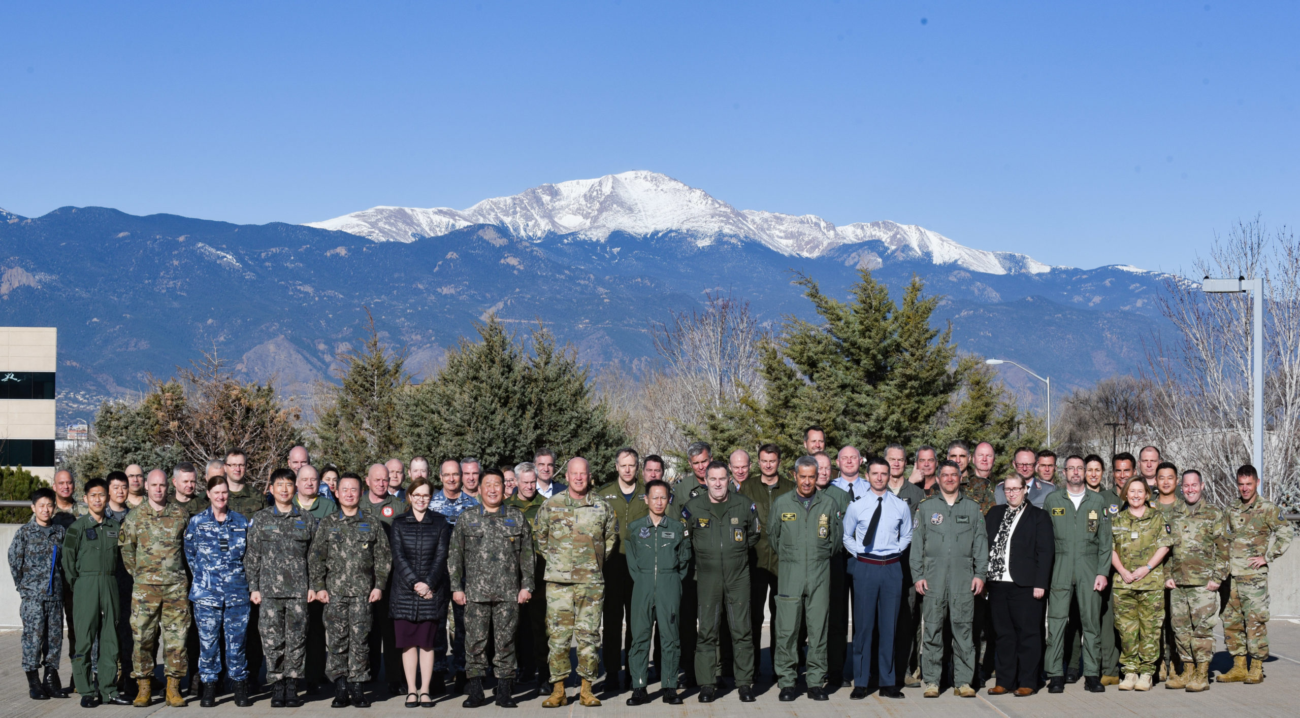 Space Chiefs gather for a group photo during the 37th Space Symposium in Colorado Springs,